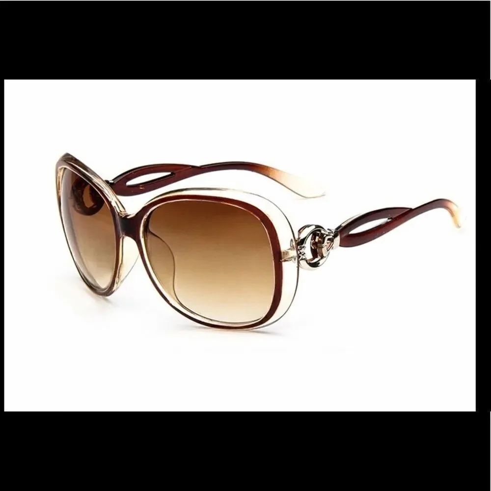 NWT hollow frame anti-UV oversized sunglasses . Have Brown and Black .